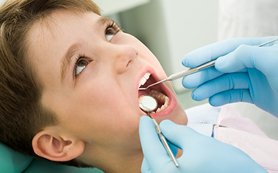 A young boy having a dental checkup