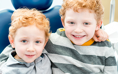 Two young boys smiling
