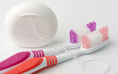 Toothbrush and floss